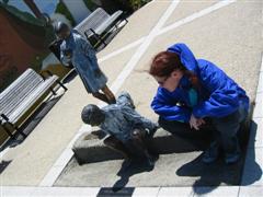 Shannon talks with the local statues